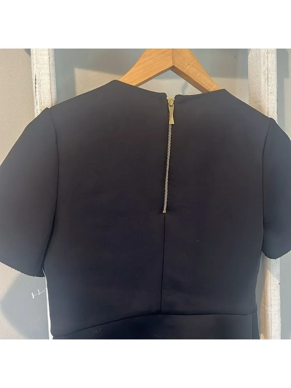 Kate spade black scuba peplum style back zip top size extra Small